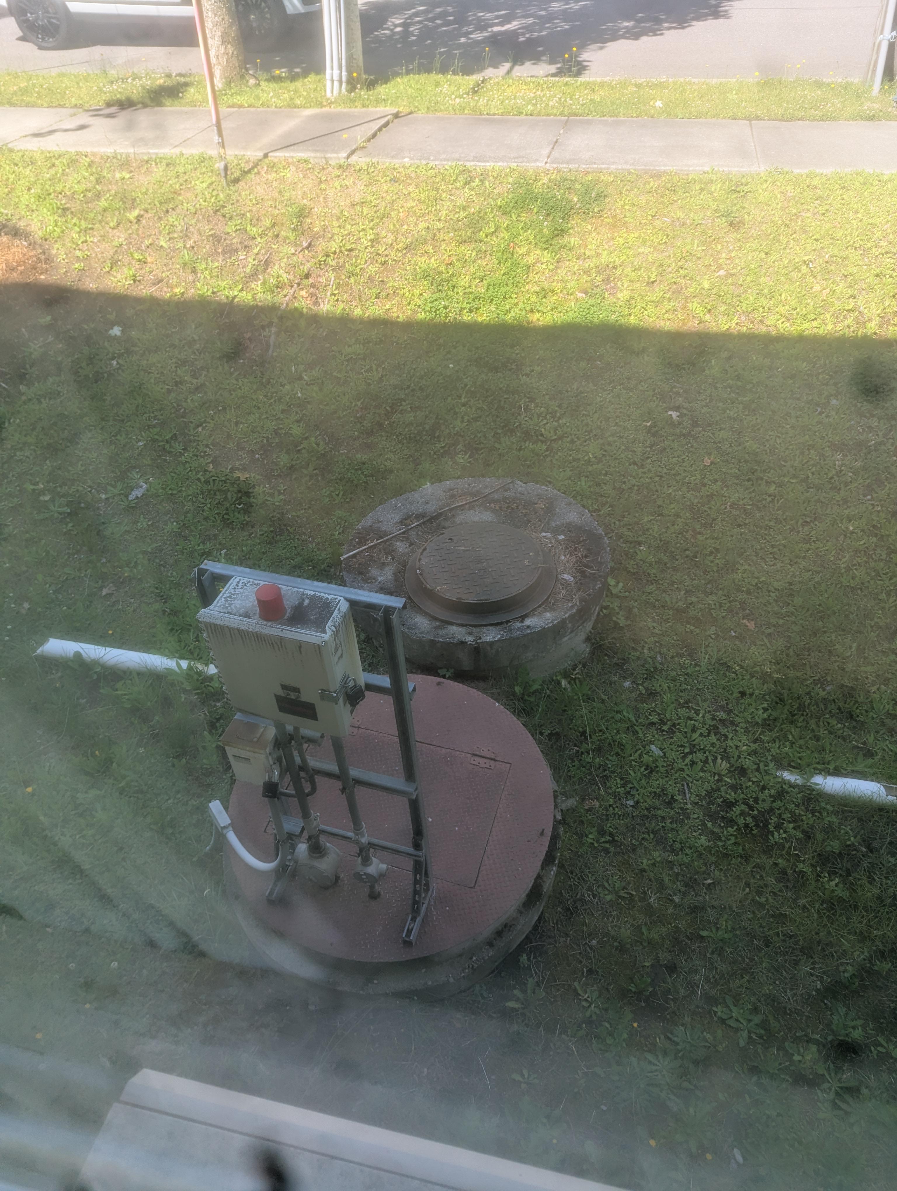A manhole cover that looks like a hatch from the game - the real world is imitating ARC Raiders now.